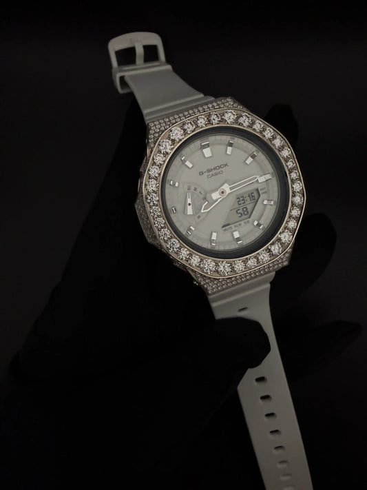 Side detail of iced out G-Shock watch with moissanite stones and luxury setting