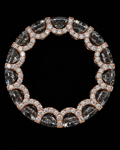 Bespoke rose gold ring with alternating round and pear-cut diamonds by ICE JEWELLER