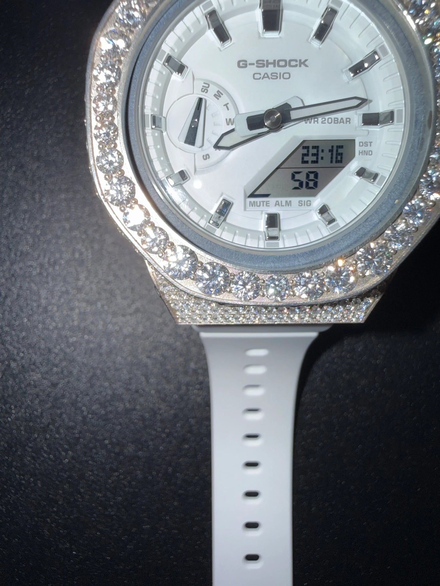 Close view of custom iced out G-Shock watch with diamond style moissanite