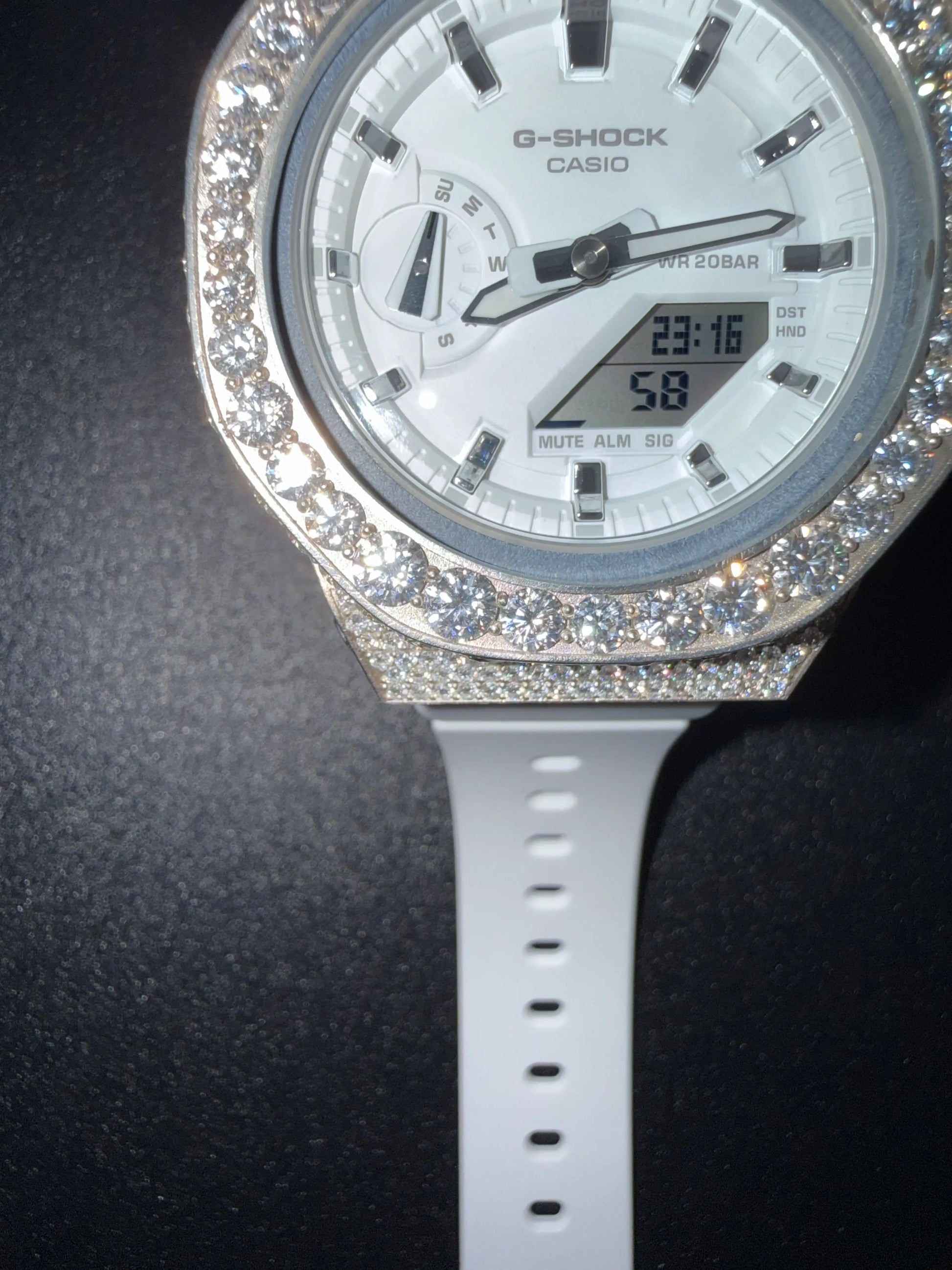 Close view of custom iced out G-Shock watch with diamond style moissanite