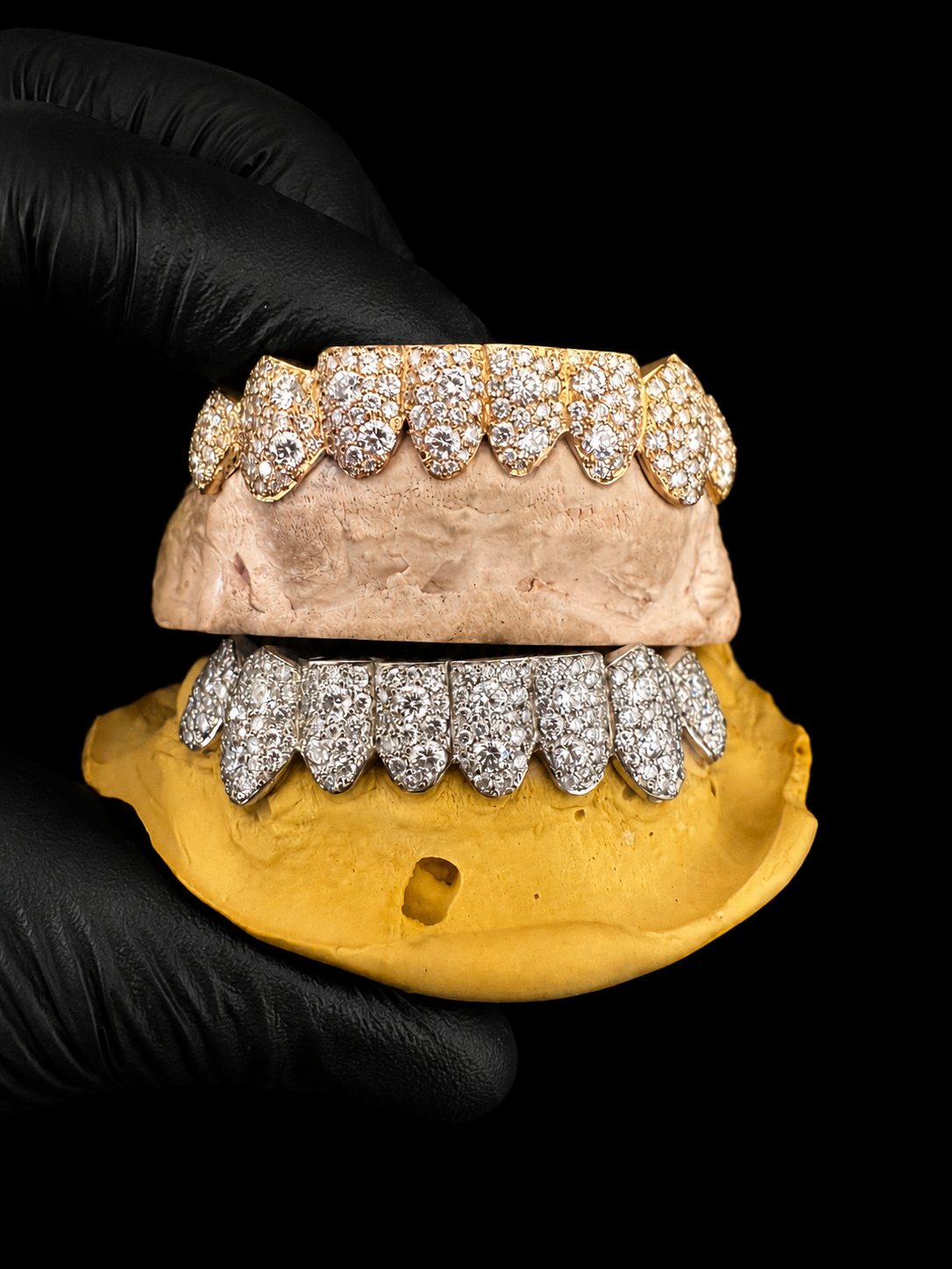 Three-quarter angle view of moissanite mosaic bustdown grillz