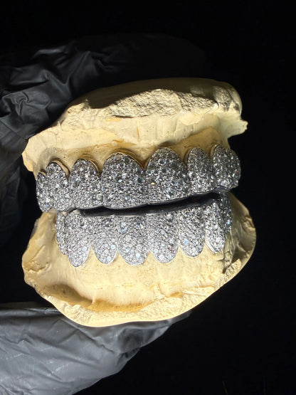 Custom diamond grillz available in sterling silver, 10K and 14K gold finishes