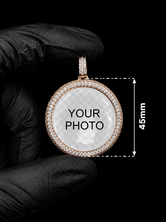 45mm custom photo memory pendant with moissanite halo shown in hand for size reference