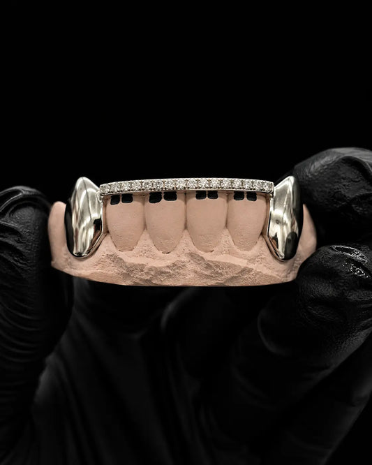 Custom VVS lab diamond bar grillz on peach dental mold with black background