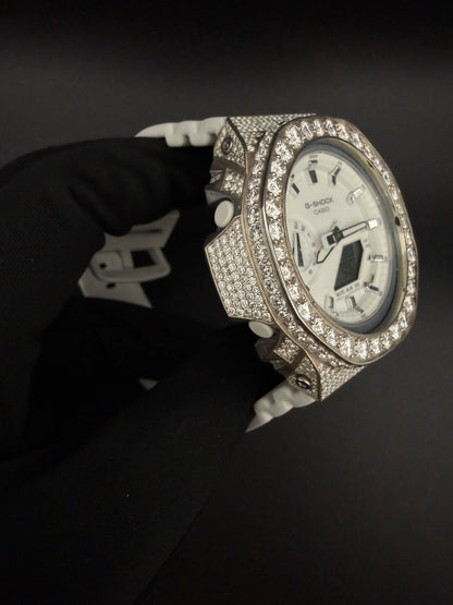 Luxury iced out G-Shock watch worn on wrist with shining moissanite diamonds