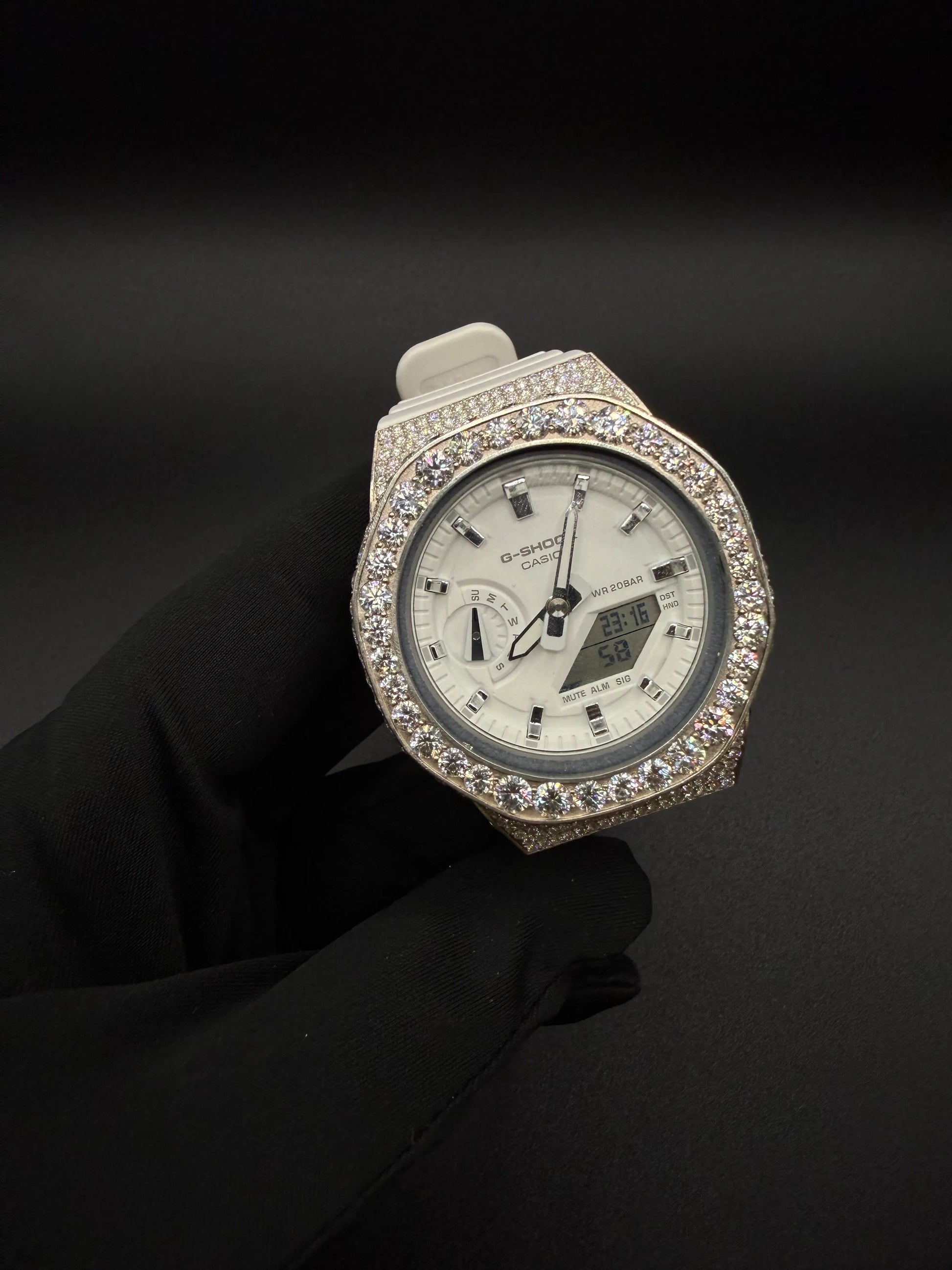 Close-up of VVS1 moissanite stones on iced out G-Shock bustdown watch