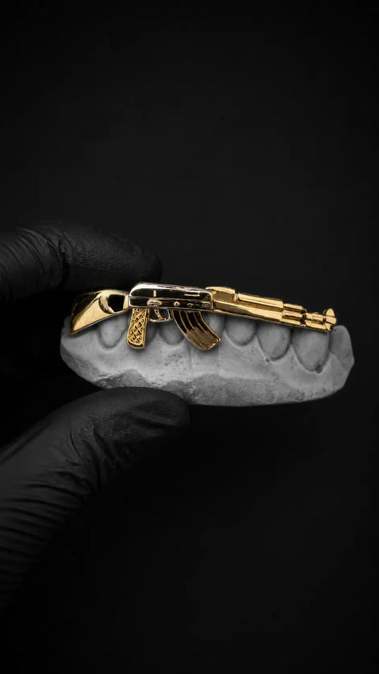 Luxury AK-47 custom fit grillz handcrafted in solid gold and silver with polished finish