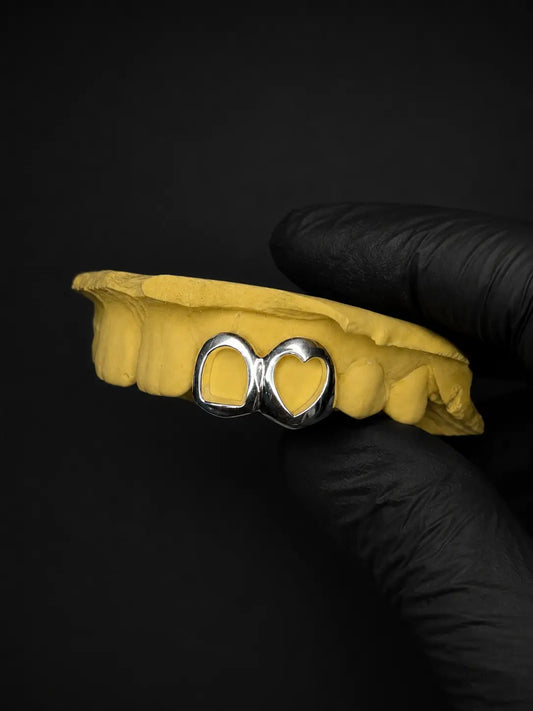 Personalized gold heart fang grillz custom made for upper teeth