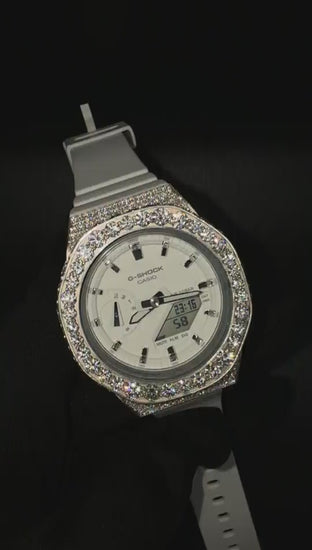 Luxury iced out G-Shock watch on wrist showing sparkle and detail