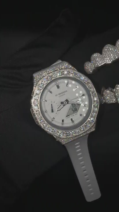 Iced out G-Shock watch shining under light with VVS1 moissanite stones