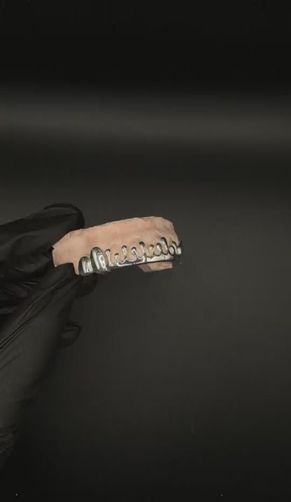 Video showcasing Custom Handmade Dripped Style Sterling Silver Grillz from multiple angles with detailed craftsmanship
