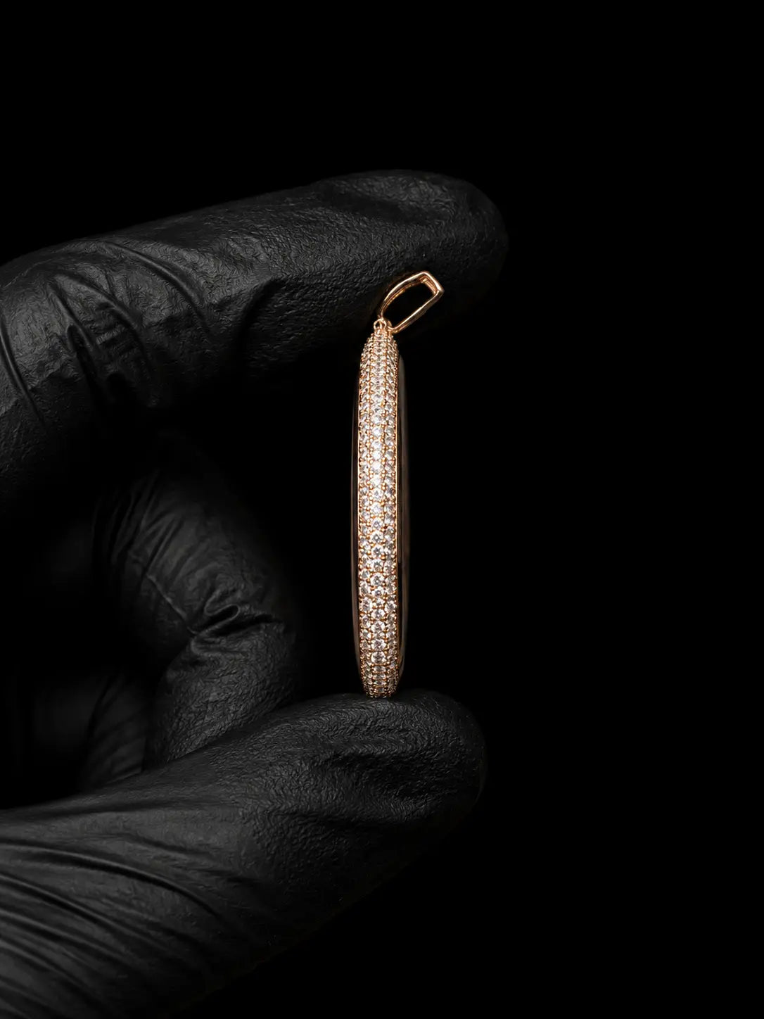 Side profile of custom moissanite halo memory pendant in rose gold with diamond setting detail